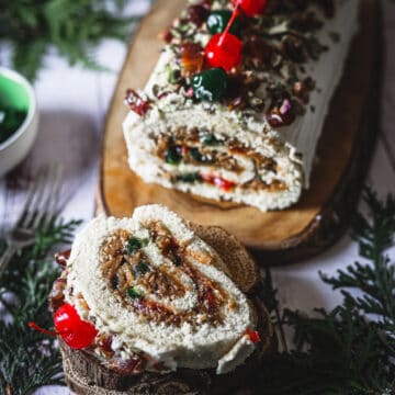 close up on yule log with one slice removed