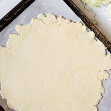 gluten free galette crust on baking sheet