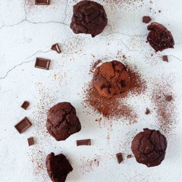 A group of gluten free triple chocolate muffins.